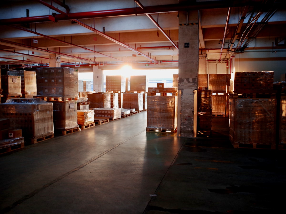 Warehouse floor stocked with palletised goods